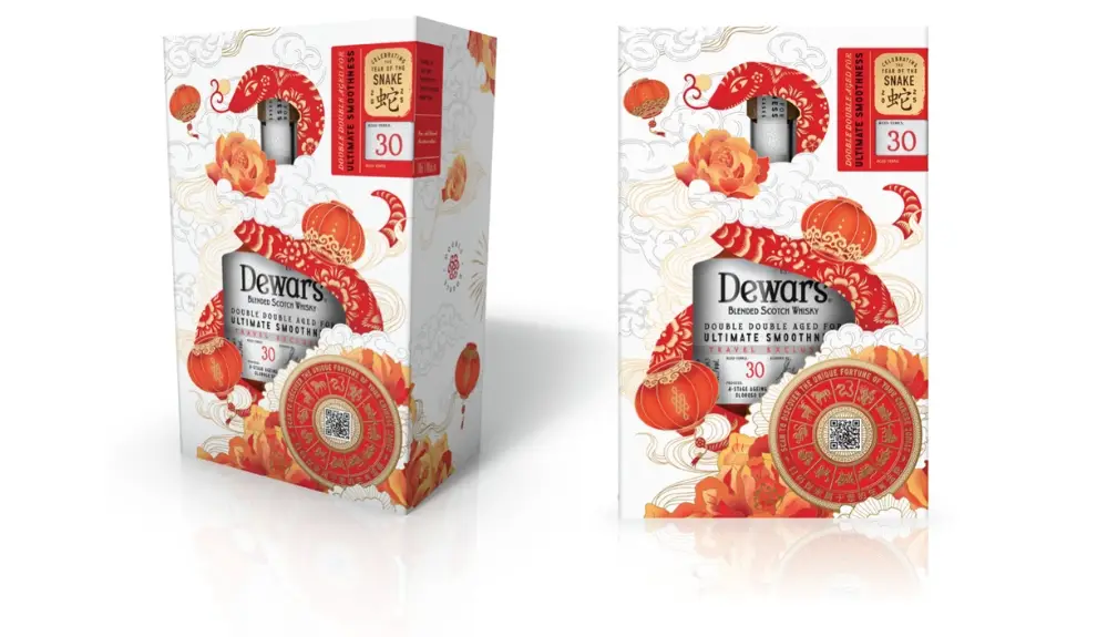 Dewar’s whisky packaging with red and gold snake artwork for Lunar New Year 2025.
