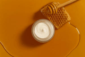 Food imagery in marketing showing honey, cream, and honeycomb symbolizing indulgence and sensory appeal