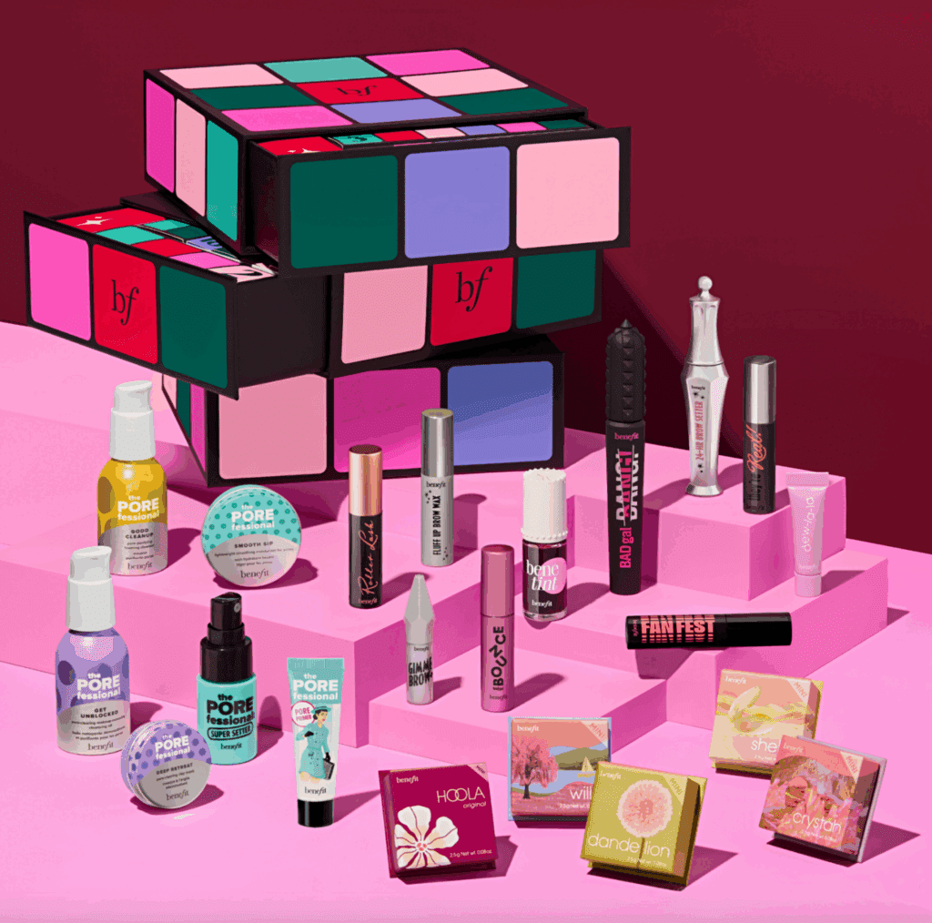 Benefit Cosmetics Rubik’s Cube–style advent calendar with colourful blocks and mini beauty products, showing playful Christmas 2025 graphic codes.