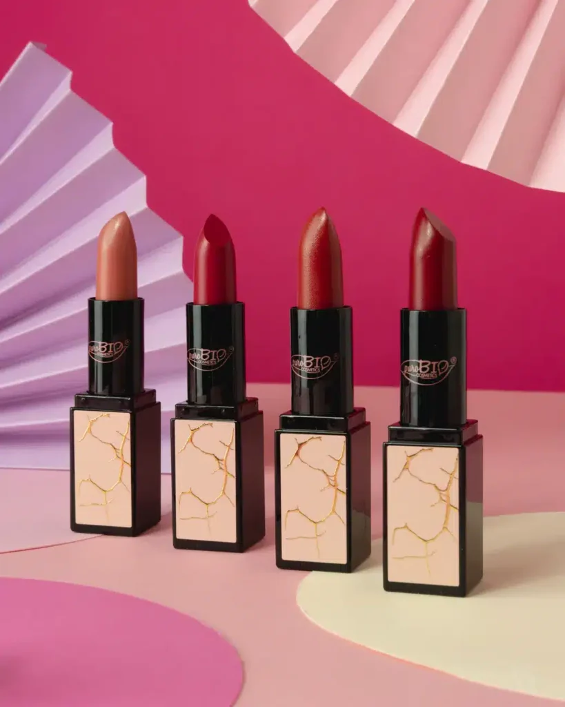 Four lipsticks with packaging featuring golden crack designs inspired by Kintsugi, symbolising Wabi Sabi beauty.