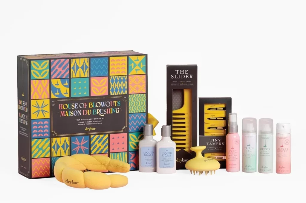 Drybar House of Blowouts gift set with colourful patterned box and yellow styling tools, reflecting winter gifting and brand-led Christmas 2025 codes.