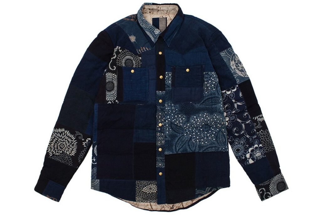 Indigo shirt made from mixed patterned fabrics showcasing Japanese Boro patchwork style.