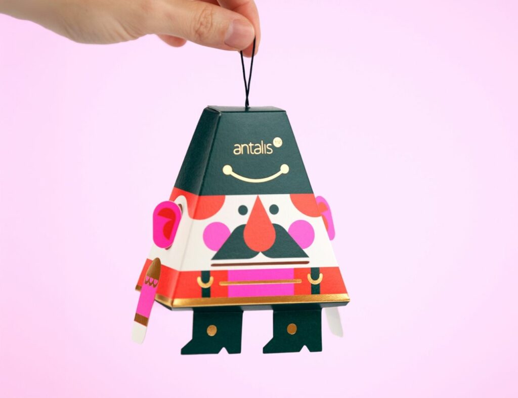 Playful character-shaped packaging illustrating graphic design trends 2026 through interaction, emotion and joyful brand expression.