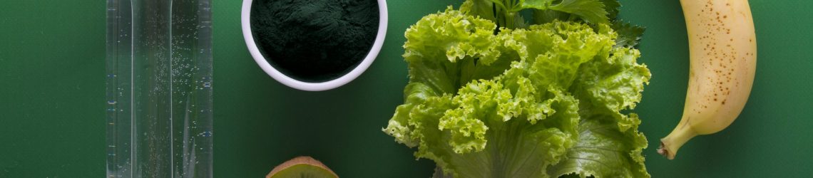 Fresh fruits, leafy greens and functional ingredients representing modern functional food and beverage trends.